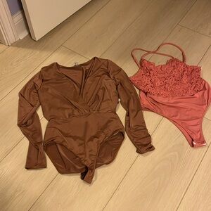 Two women”s Charlotte Russe brand bodysuits plus a coordinating top